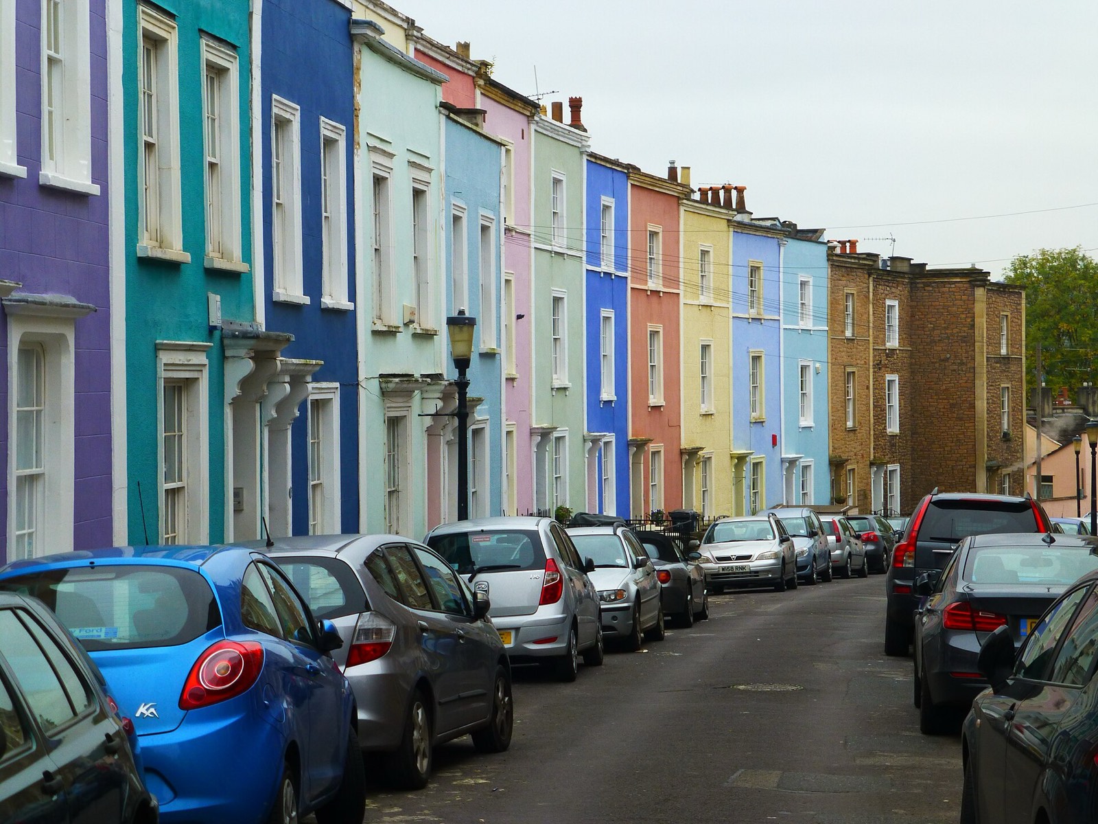 Colourful terraced houses in Cliftonwood, Bristol, on a hillside above the harbour